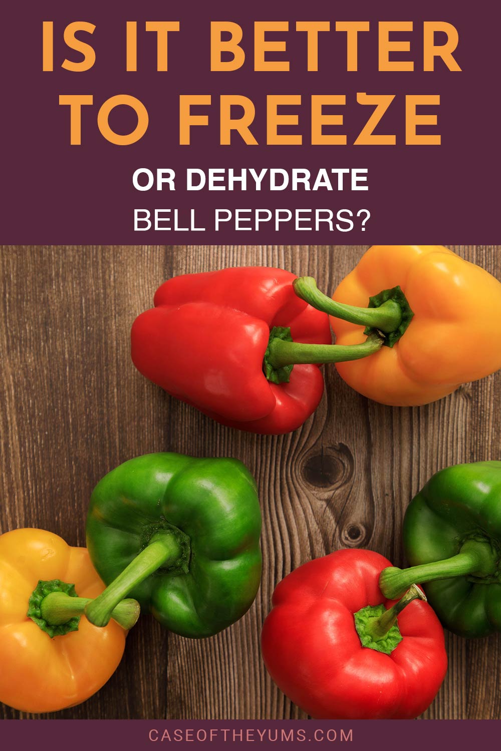 Red, green and yellow Bell Peppers on a wooden surface - Is It Better To Freeze Or Dehydrate them?