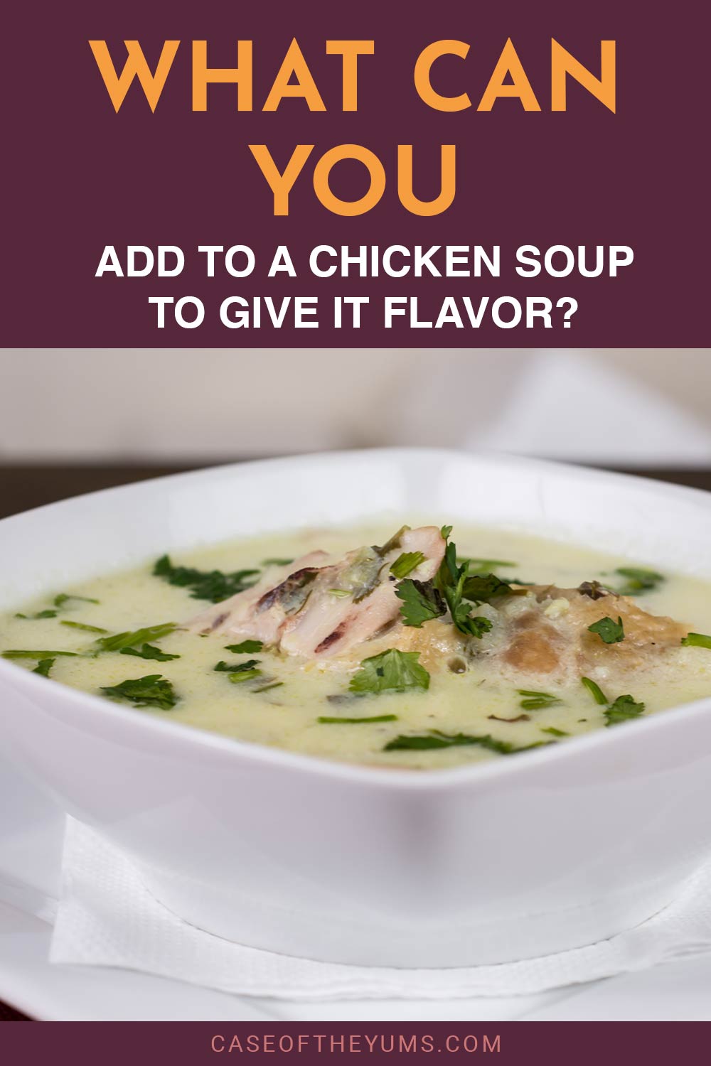 Chicken soup in a white bowl on a wooden table - What Can You Add To Give It Flavor?